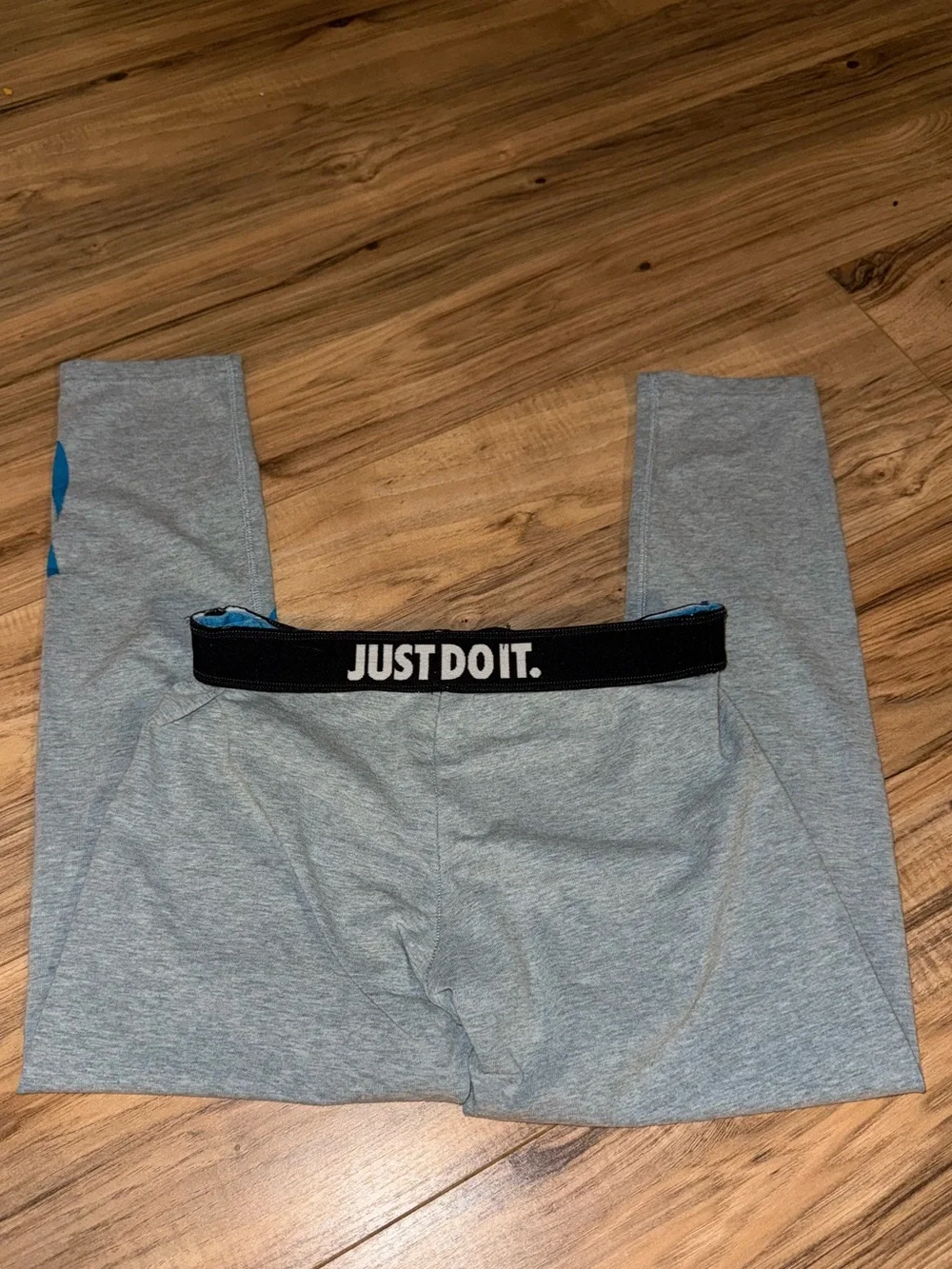 Nike Gray leggings with Blue Swoosh Logo